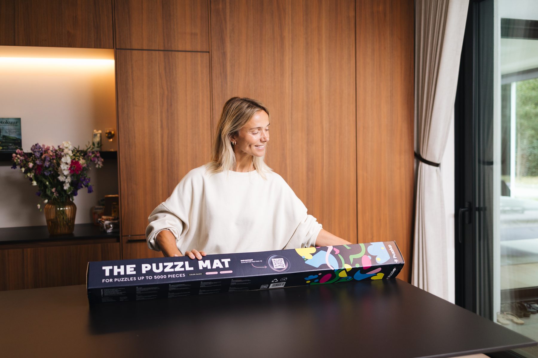 Opening a Puzzlup puzzle mat at home